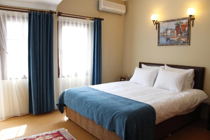 Imagen de la habitación del Utopia Lodge Hotel. Foto 15