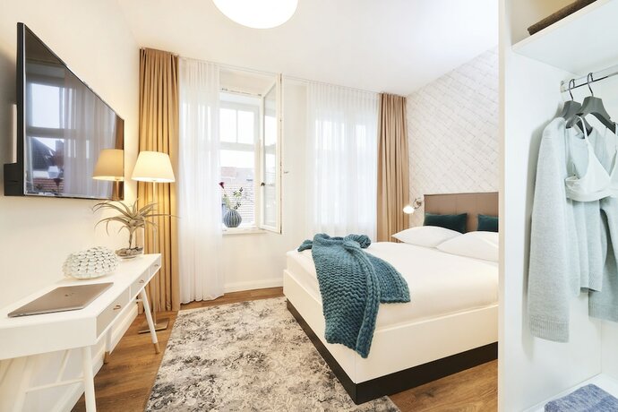 Imagen de la habitación del &Uuml;berFluss Apartments. Foto 18
