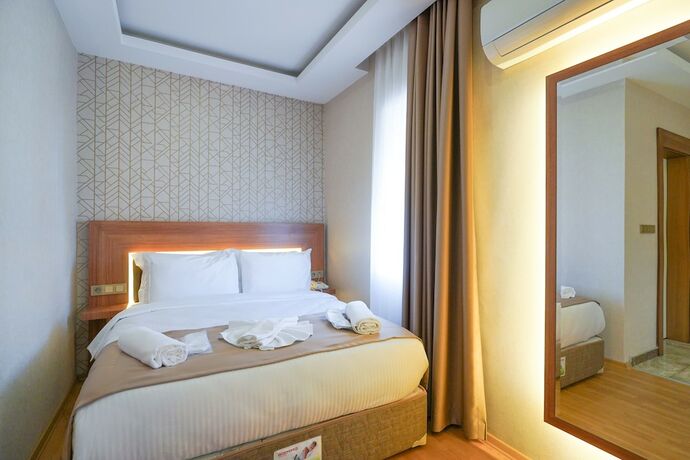 Imagen de la habitación del Uğurlu Hotel. Foto 19