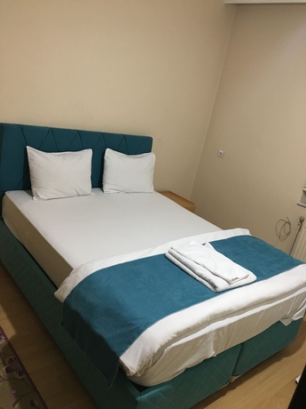 Imagen de la habitación del Uygun Otel, Yakutiye. Foto 6
