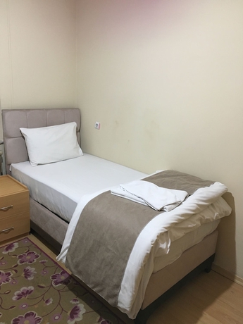 Imagen de la habitación del Uygun Otel, Yakutiye. Foto 11