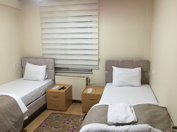 Imagen de la habitación del Uygun Otel, Yakutiye. Foto 13