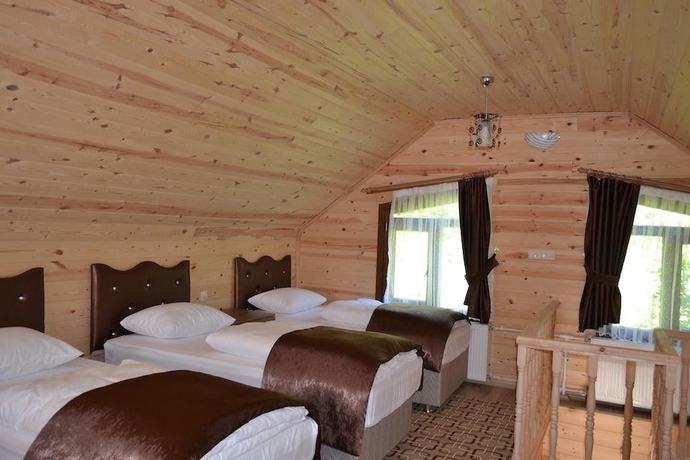 Imagen de la habitación del Uzungol Bungalow House. Foto 2