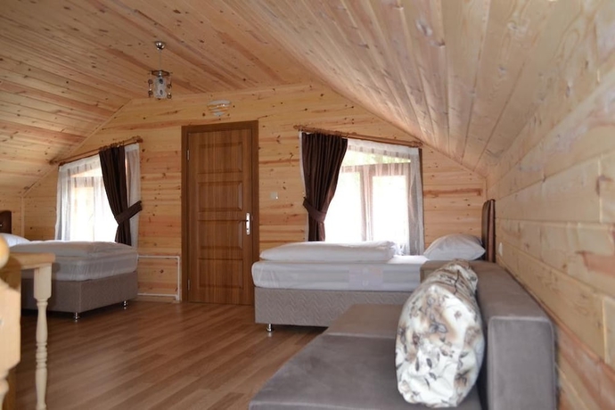 Imagen de la habitación del Uzungol Bungalow House. Foto 17