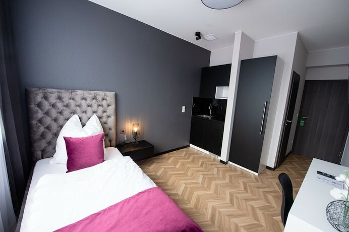 Imagen de la habitación del V Business Living Appartment. Foto 18