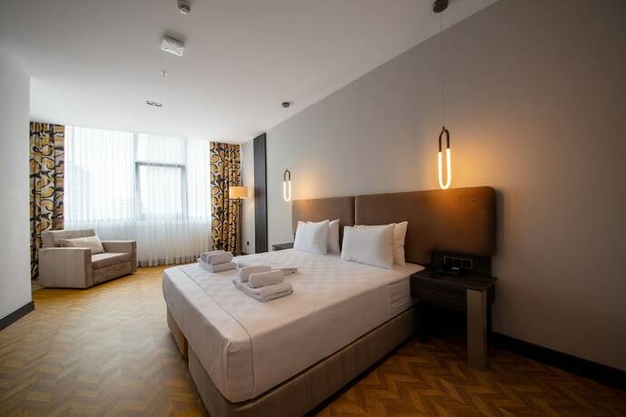 Imagen de la habitación del V Center Hotel. Foto 11