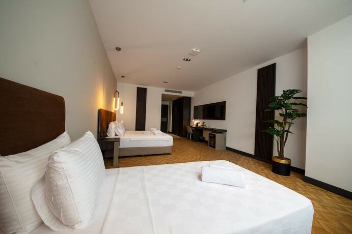 Imagen de la habitación del V Center Hotel. Foto 12