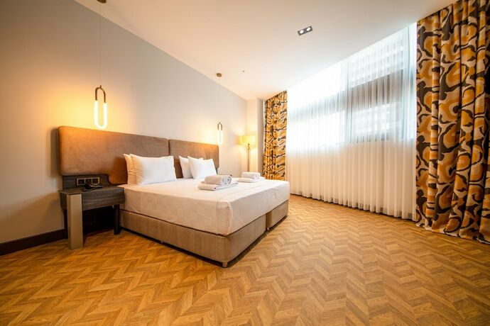 Imagen de la habitación del V Center Hotel. Foto 13