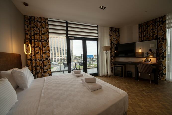 Imagen de la habitación del V Center Hotel. Foto 14