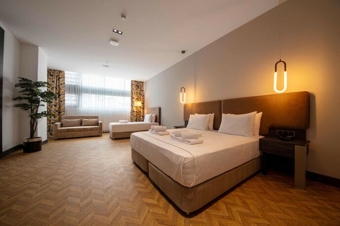 Imagen de la habitación del V Center Hotel. Foto 15