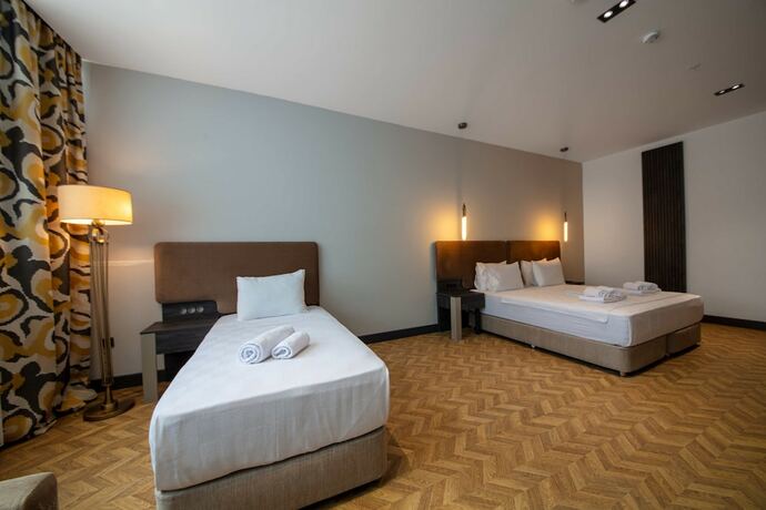 Imagen de la habitación del V Center Hotel. Foto 17