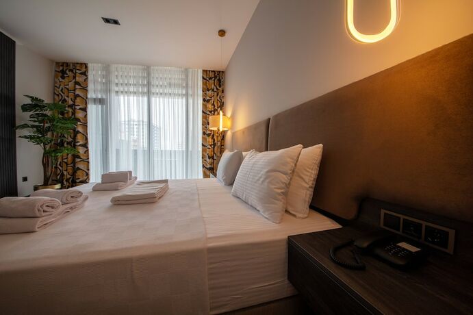 Imagen de la habitación del V Center Hotel. Foto 19