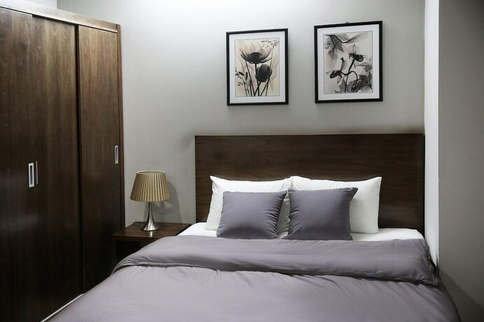 Imagen de la habitación del V House 6 Serviced Apartment. Foto 31