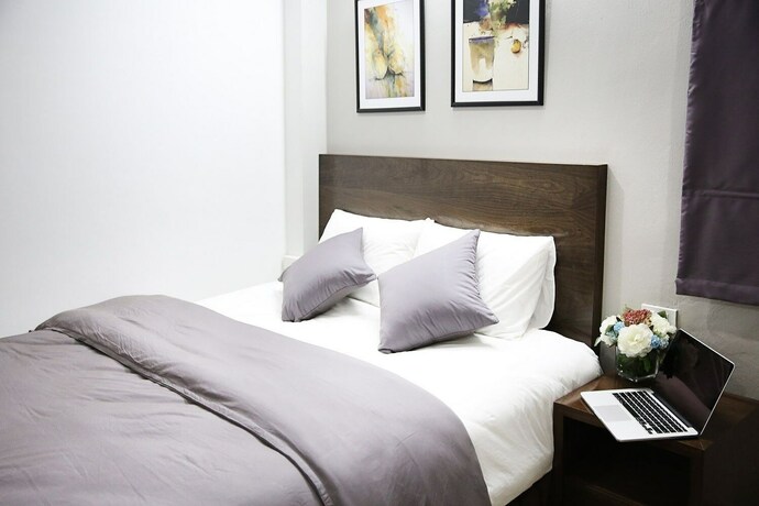 Imagen de la habitación del V House 6 Serviced Apartment. Foto 33