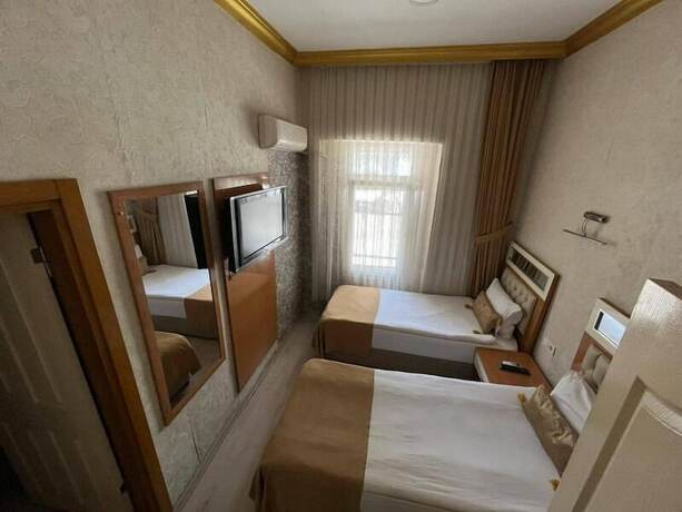 Imagen de la habitación del VATAN OTEL. Foto 11