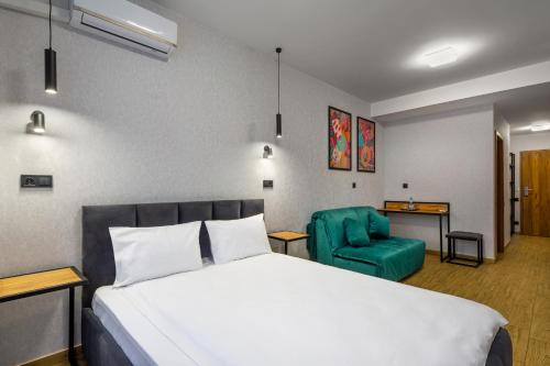 Imagen de la habitación del VATRA HOTEL. Foto 18