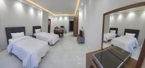 Imagen de la habitación del VISION SUITES ELAHYAA Aqua park. Foto 18