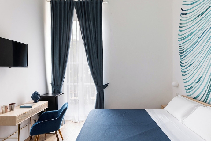 Imagen de la habitación del VITRUVIO SUITES. Foto 7