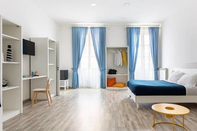 Imagen de la habitación del VITRUVIO SUITES. Foto 15