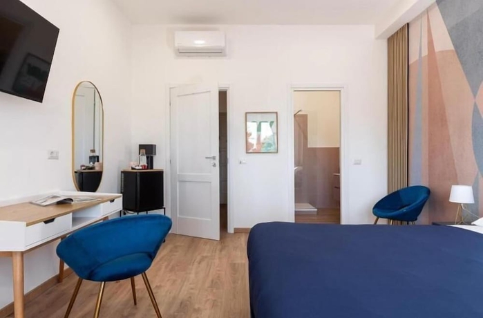 Imagen de la habitación del VITRUVIO SUITES. Foto 16