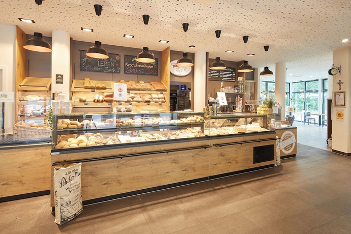 Imagen del bar/restaurante del VR-Serviced Apartments Obergeis. Foto 4