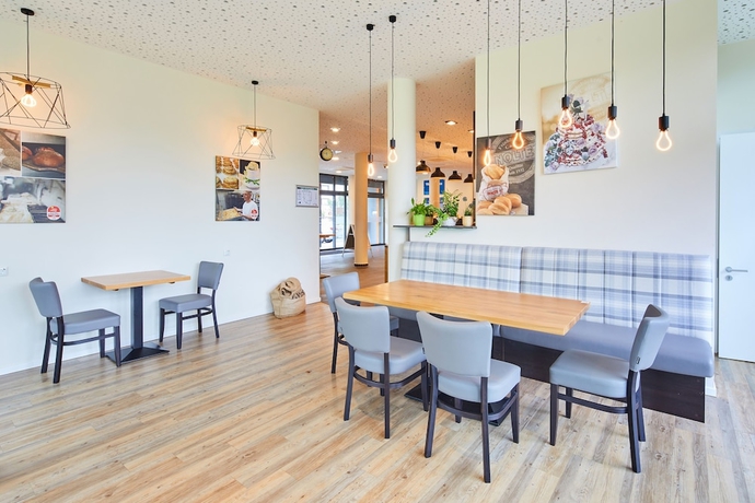 Imagen del bar/restaurante del VR-Serviced Apartments Obergeis. Foto 5