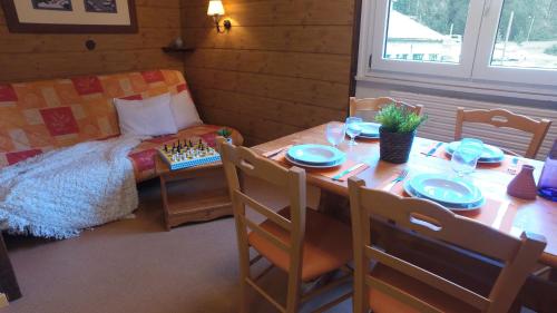 Imagen de la habitación del VVF Les Monts Jura. Foto 6