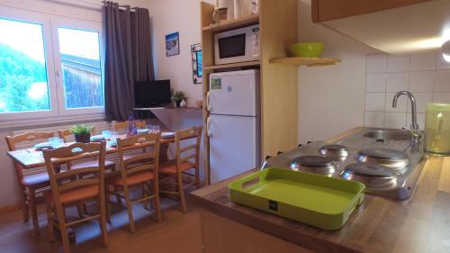 Imagen de la habitación del VVF Les Monts Jura. Foto 7