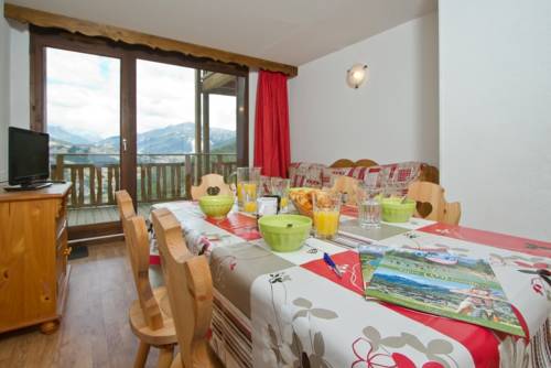 Imagen de la habitación del Vacanc&eacute;ole - R&eacute;sidence Les Chalets Et Balcons De L. Foto 8