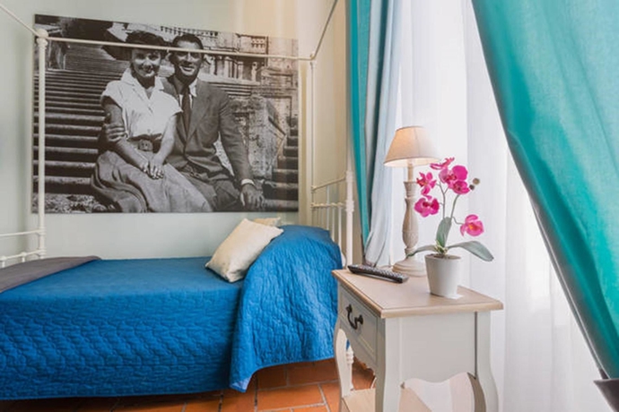 Imagen de la habitación del Vacanze Romane Rooms. Foto 6