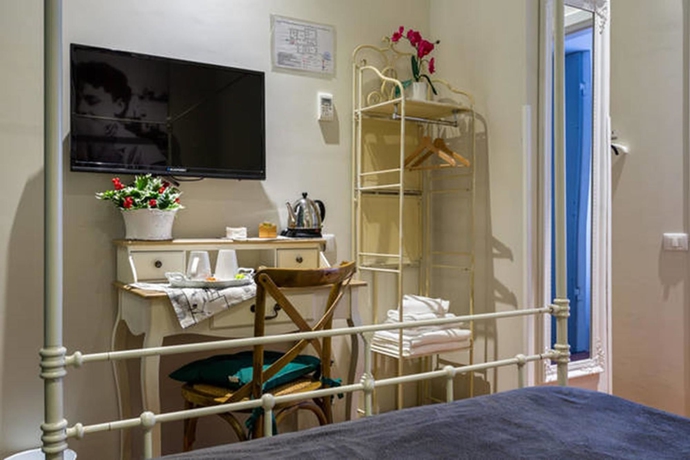 Imagen de la habitación del Vacanze Romane Rooms. Foto 9