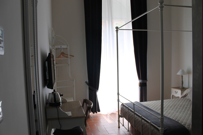 Imagen de la habitación del Vacanze Romane Rooms. Foto 11