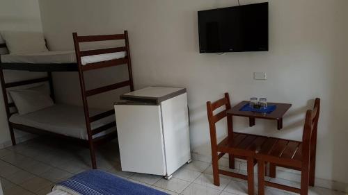 Imagen de la habitación del Velinn Pousada Ubatuba Tropical. Foto 7
