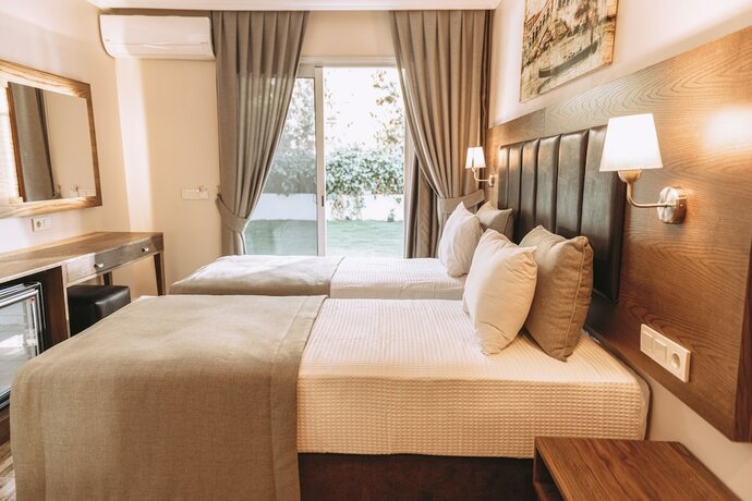 Imagen de la habitación del Venezia Alacati by Nobela. Foto 16