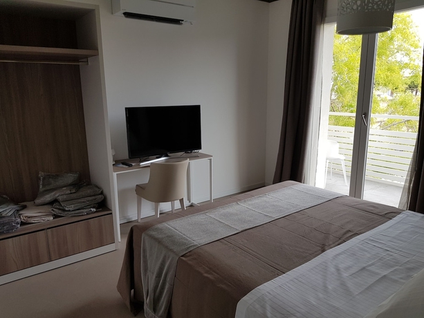 Imagen de la habitación del Venus Suites. Foto 9