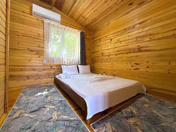 Imagen de la habitación del Ven&uuml;s Gold Bungalov. Foto 4