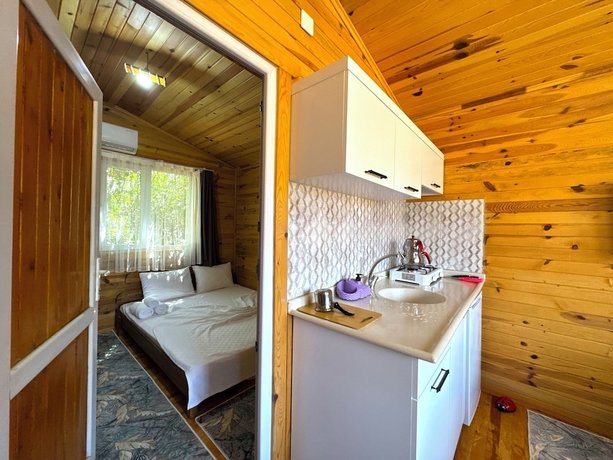 Imagen de la habitación del Ven&uuml;s Gold Bungalov. Foto 6