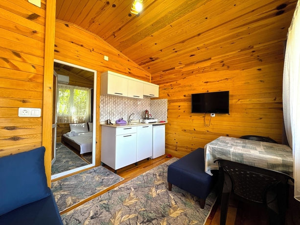 Imagen de la habitación del Ven&uuml;s Gold Bungalov. Foto 14