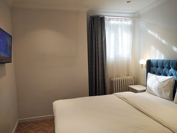 Imagen de la habitación del Verna Hotel. Foto 20