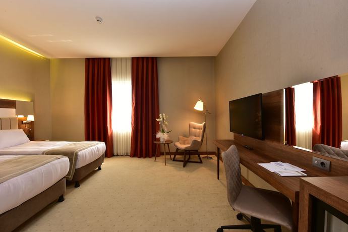 Imagen de la habitación del Vespia Hotel. Foto 15