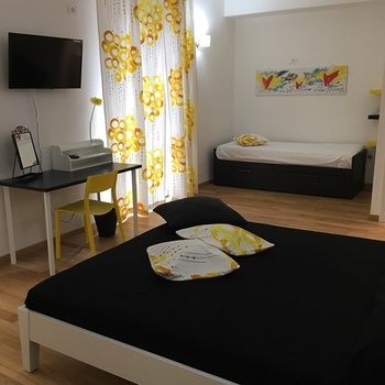 Imagen de los interiores del Via Colombo Holiday Rooms. Foto 16