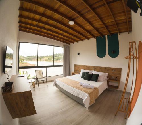 Imagen de la habitación del Viajero Guatap&eacute; Hostel. Foto 14