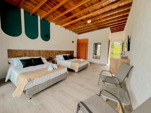 Imagen de la habitación del Viajero Guatap&eacute; Hostel. Foto 16