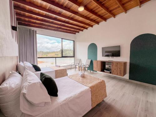 Imagen de la habitación del Viajero Guatap&eacute; Hostel. Foto 20
