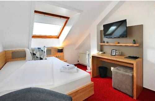 Imagen de la habitación del Vico's Hotel & Restaurant Asperg. Foto 8