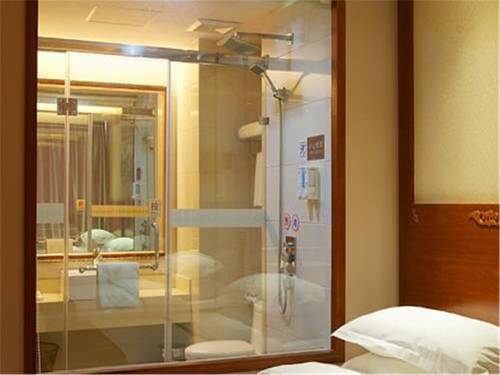 Imagen de la habitación del Vienna Hotel Shanghai Pudong Airport Huaxia Road. Foto 6