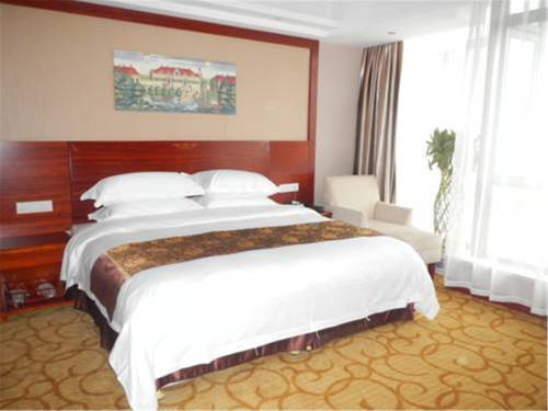 Imagen de la habitación del Vienna Hotel Shanghai Pudong Airport Huaxia Road. Foto 8