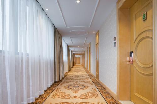 Imagen de la habitación del Vienna Hotel (Yongjia Oubei). Foto 8