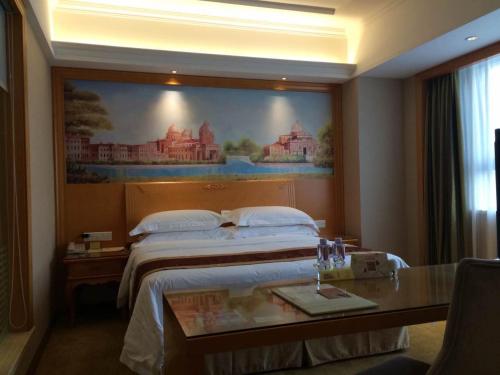 Imagen de la habitación del Vienna International Hotel (Shenzhen Buji Dafen Metro Station). Foto 6