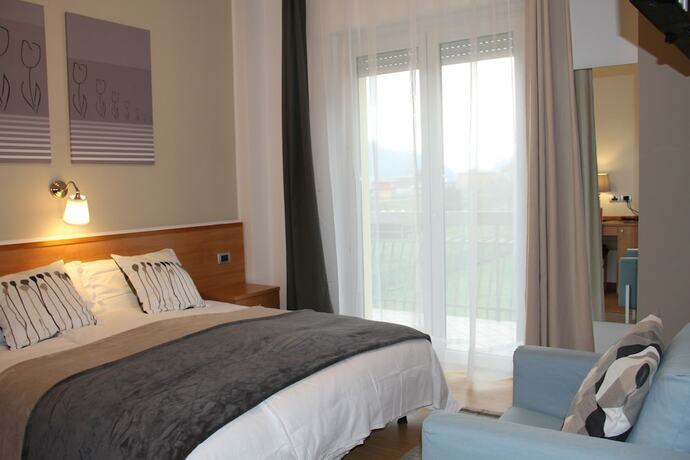 Imagen de la habitación del Vignola Rooms Avio. Foto 19